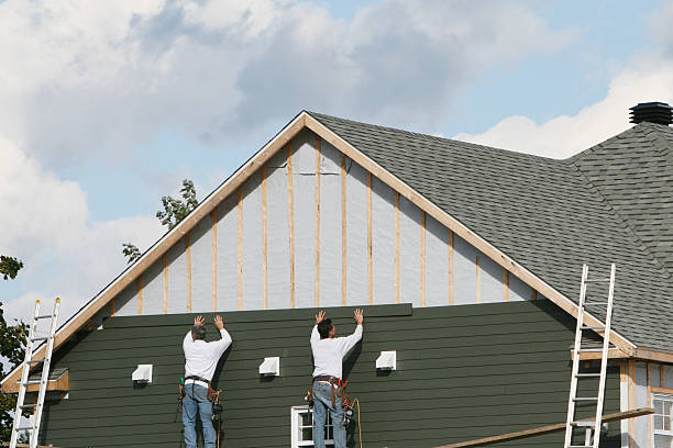 Professional Vinyl Siding technician working in Lakeview, NY
